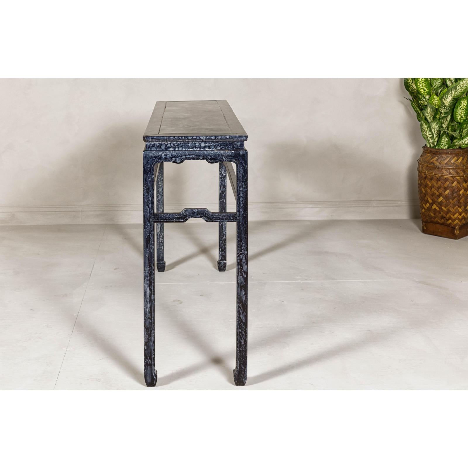 Marbleized Console Table with Silver and Black Finish and Humpback Stretcher