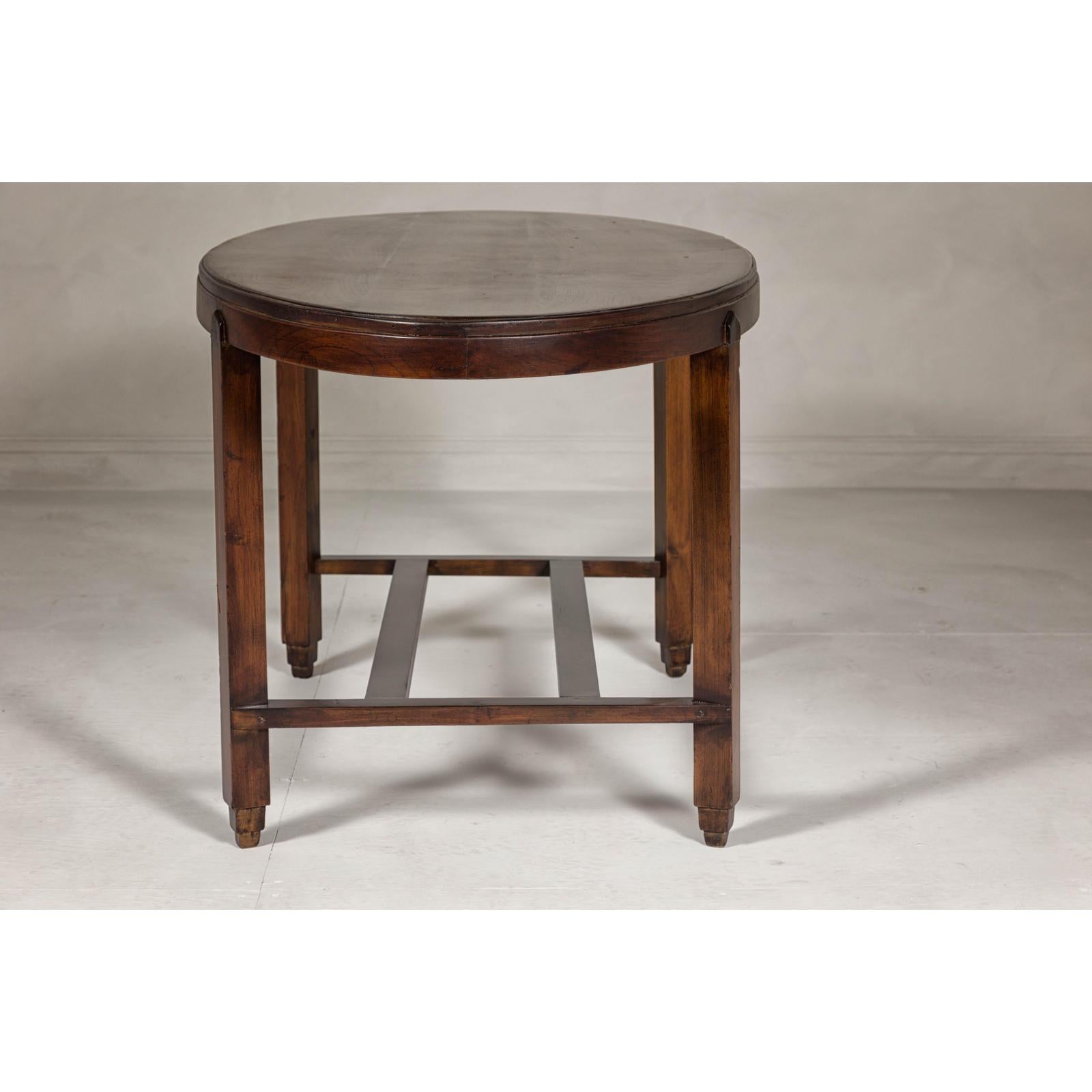 Oval Top Center Table with Inverted Stepped Pyramid Feet and Cross Stretcher