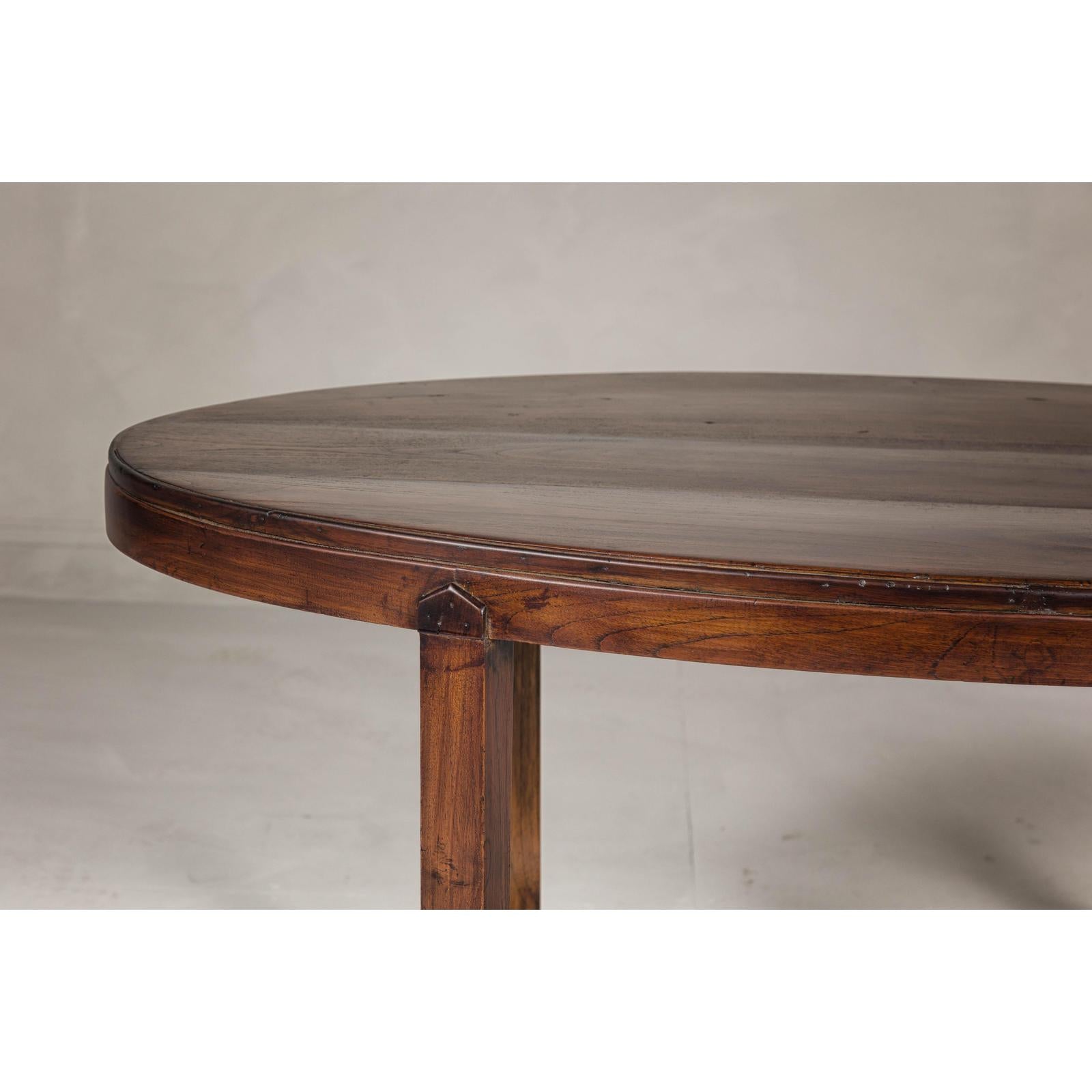 Oval Top Center Table with Inverted Stepped Pyramid Feet and Cross Stretcher