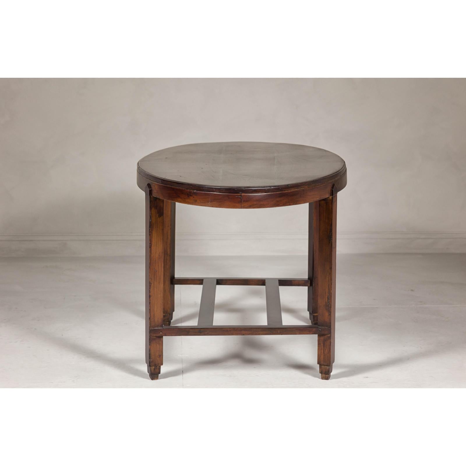 Oval Top Center Table with Inverted Stepped Pyramid Feet and Cross Stretcher