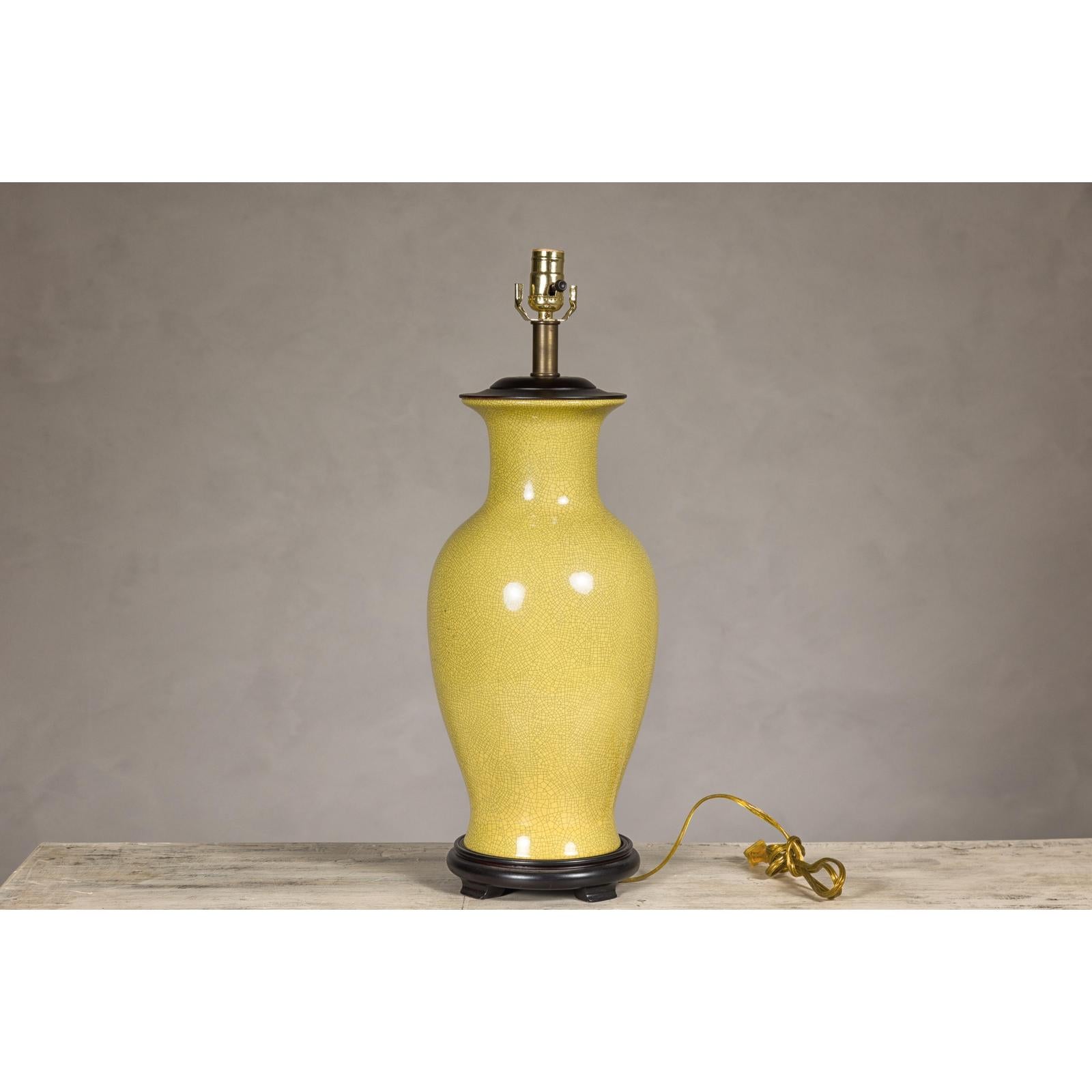 Yellow Crackle Glazed Ceramic Vase with Round Belly on Wooden Base