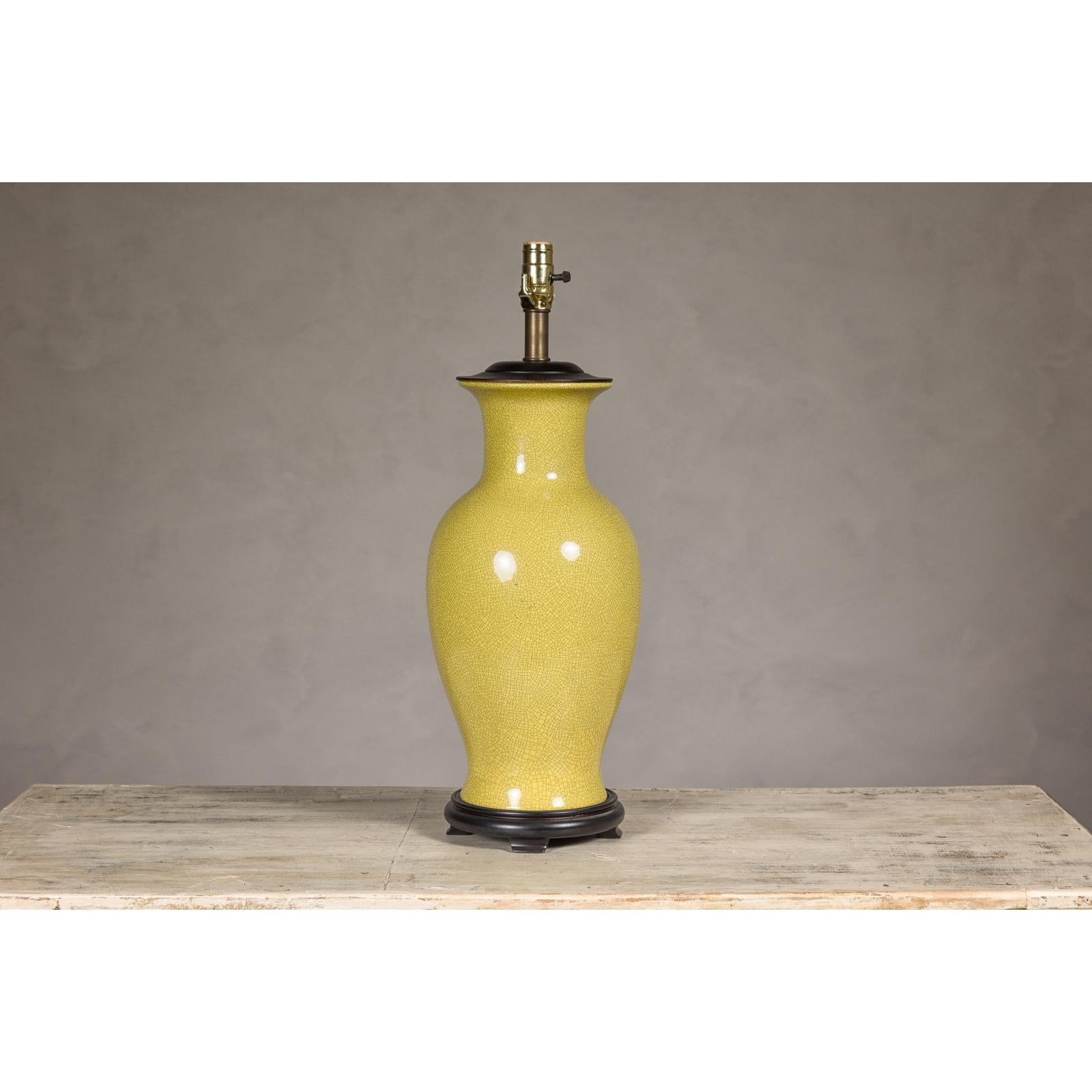 Yellow Crackle Glazed Ceramic Vase with Round Belly on Wooden Base