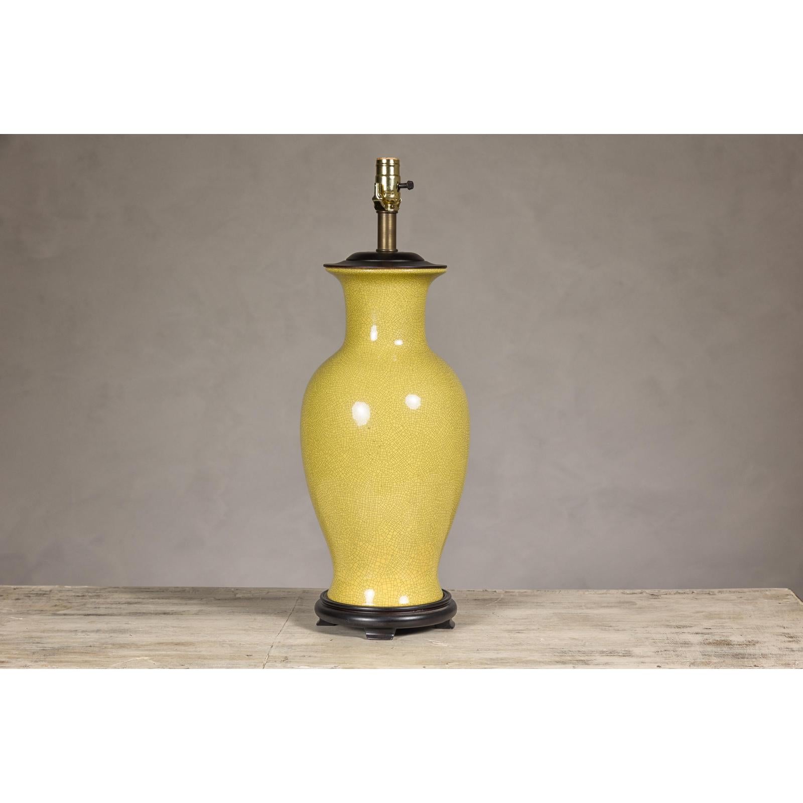 Yellow Crackle Glazed Ceramic Vase with Round Belly on Wooden Base