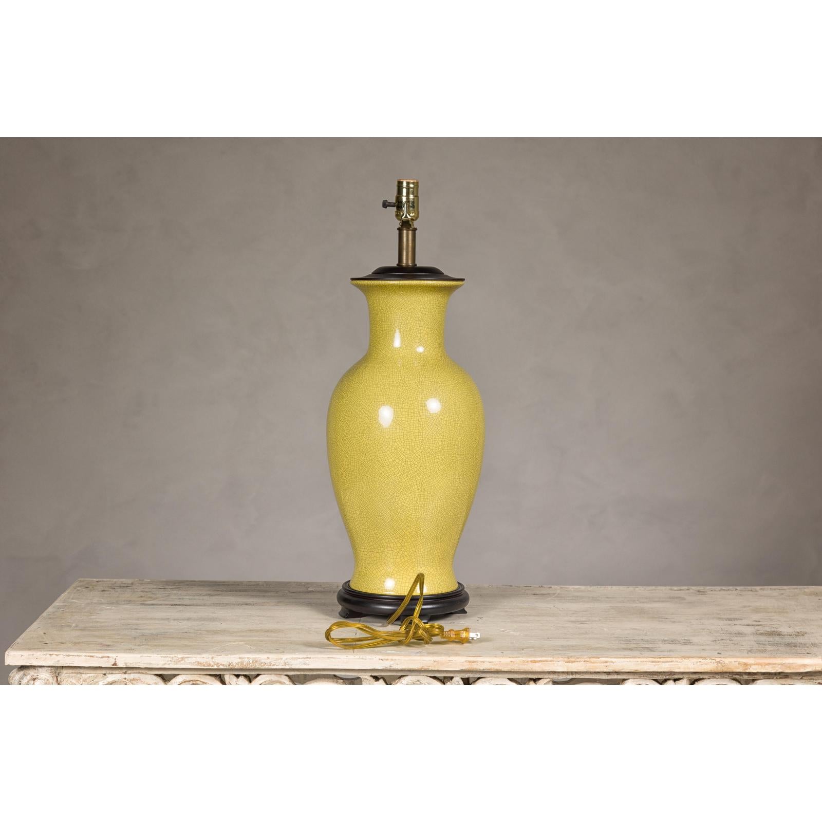 Yellow Crackle Glazed Ceramic Vase with Round Belly on Wooden Base