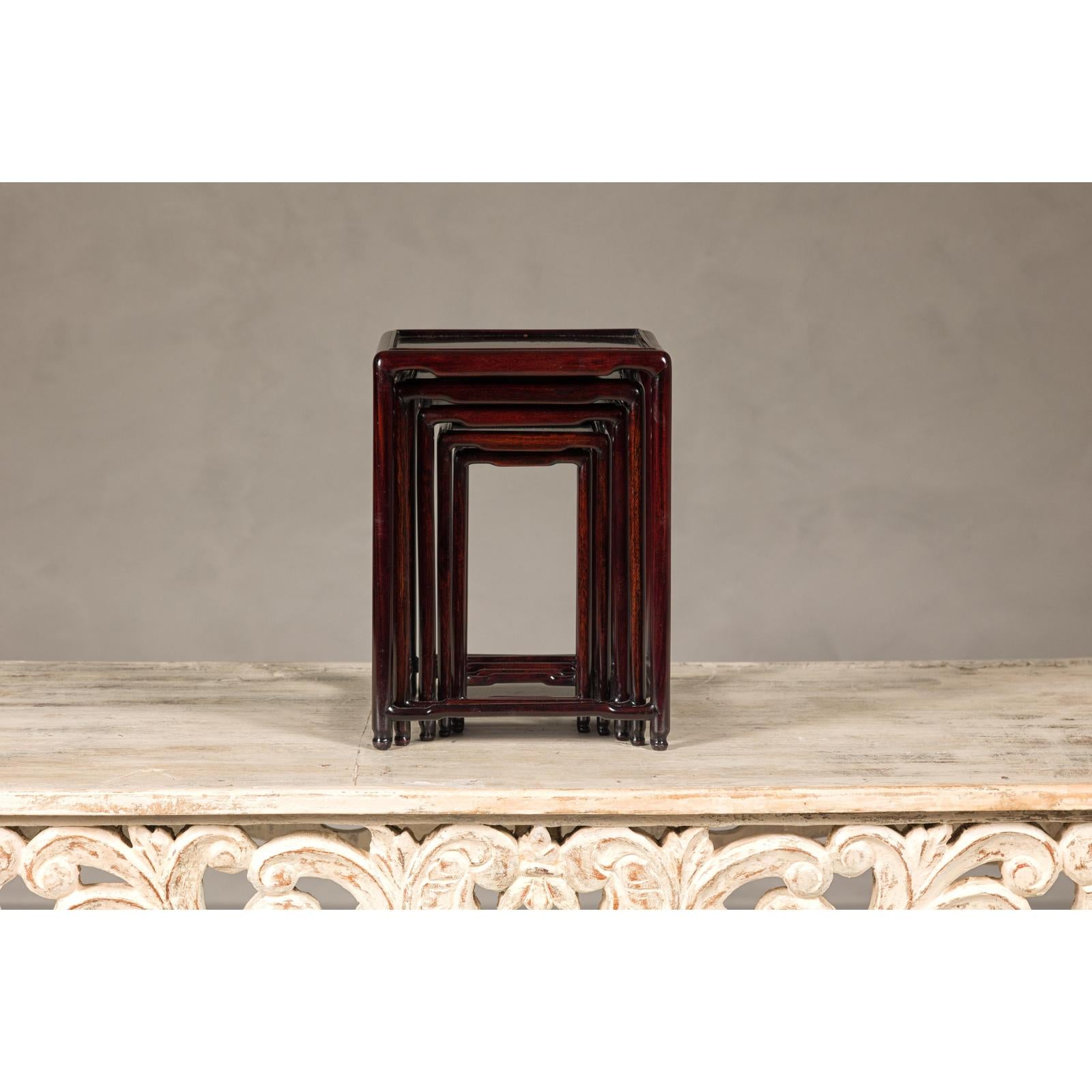 Set of Five Small Size Dark Rosewood Nesting Tables with Humpback Stretchers