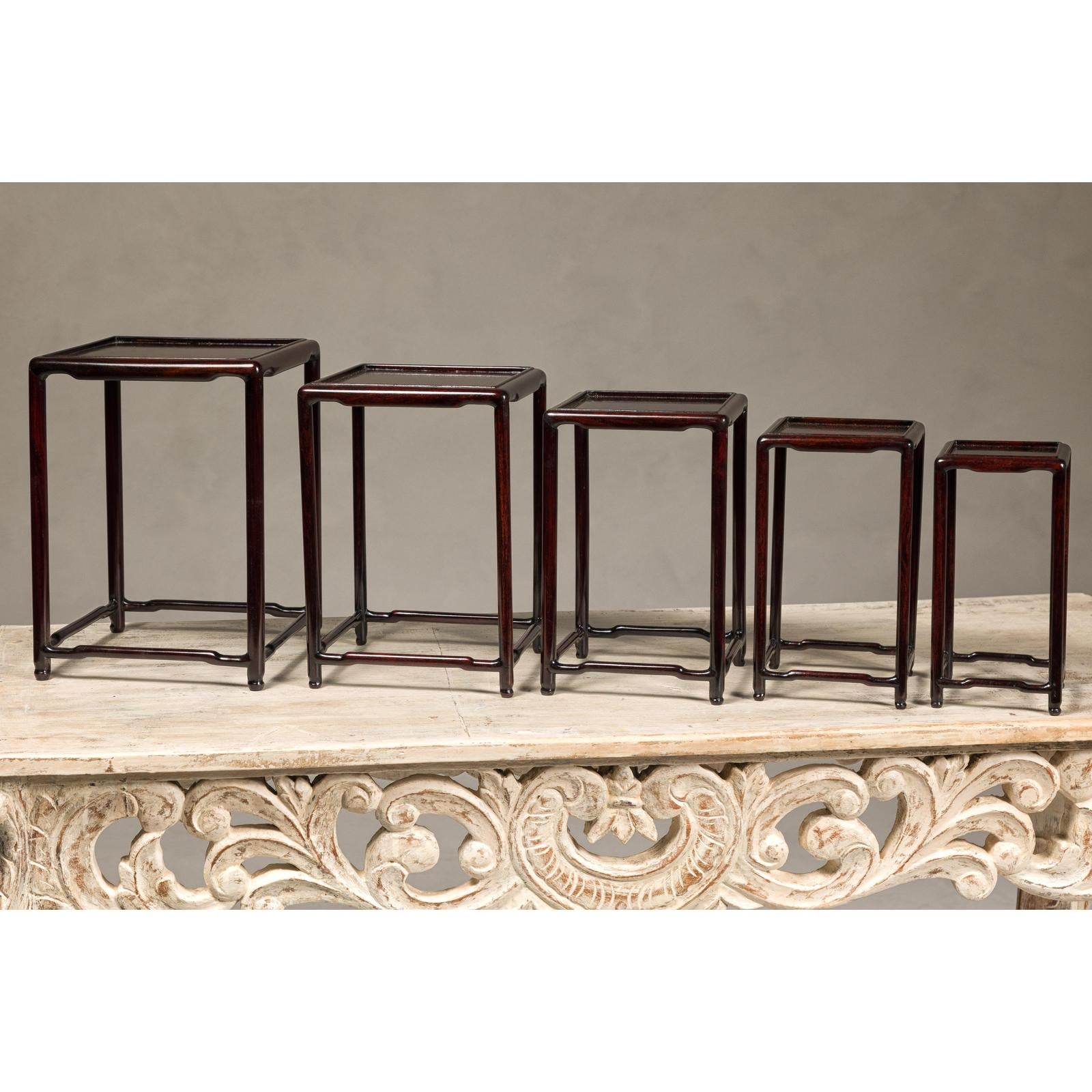 Set of Five Small Size Dark Rosewood Nesting Tables with Humpback Stretchers