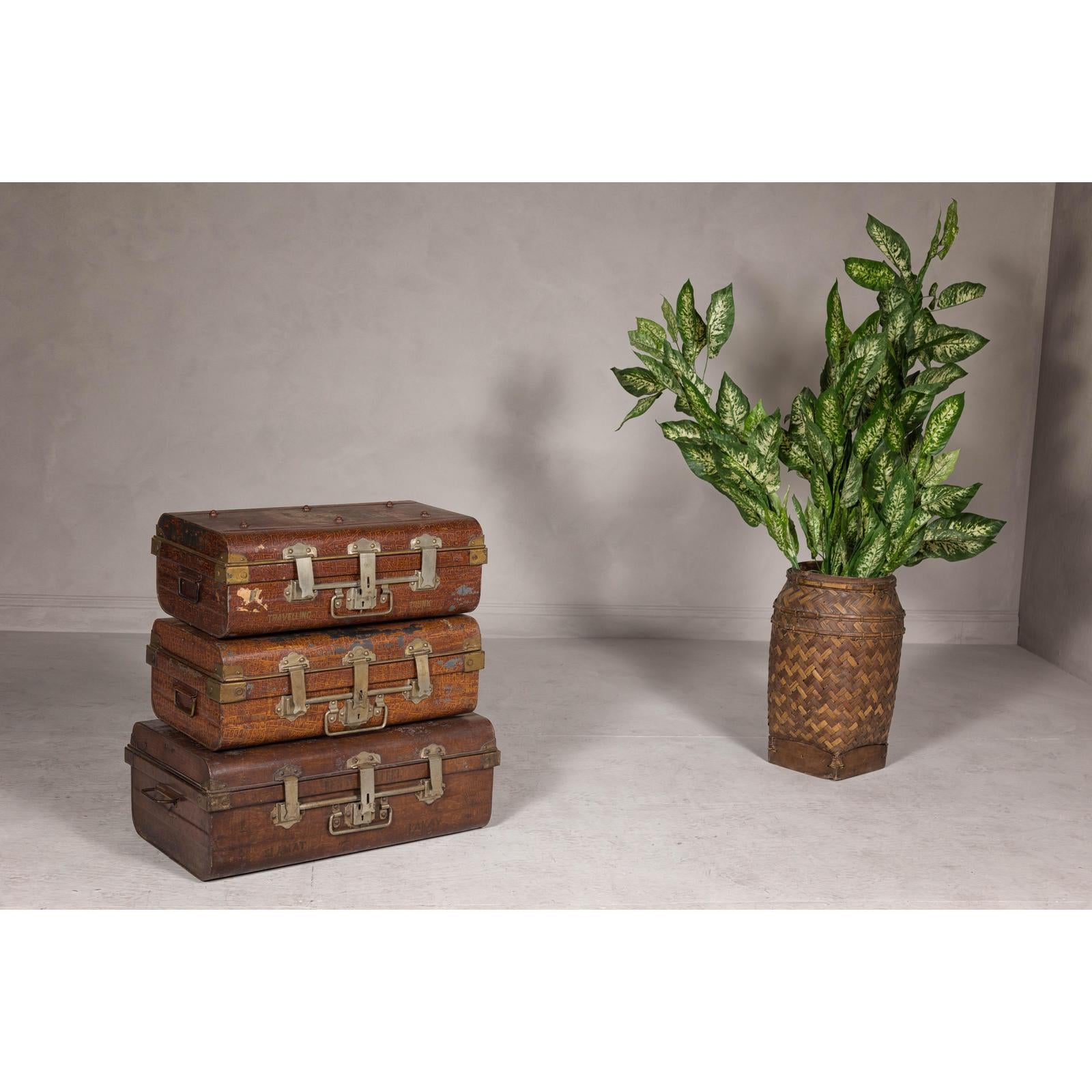 Set of Three British 1920s Metal Traveling Trunks for Export with Brass Hardware