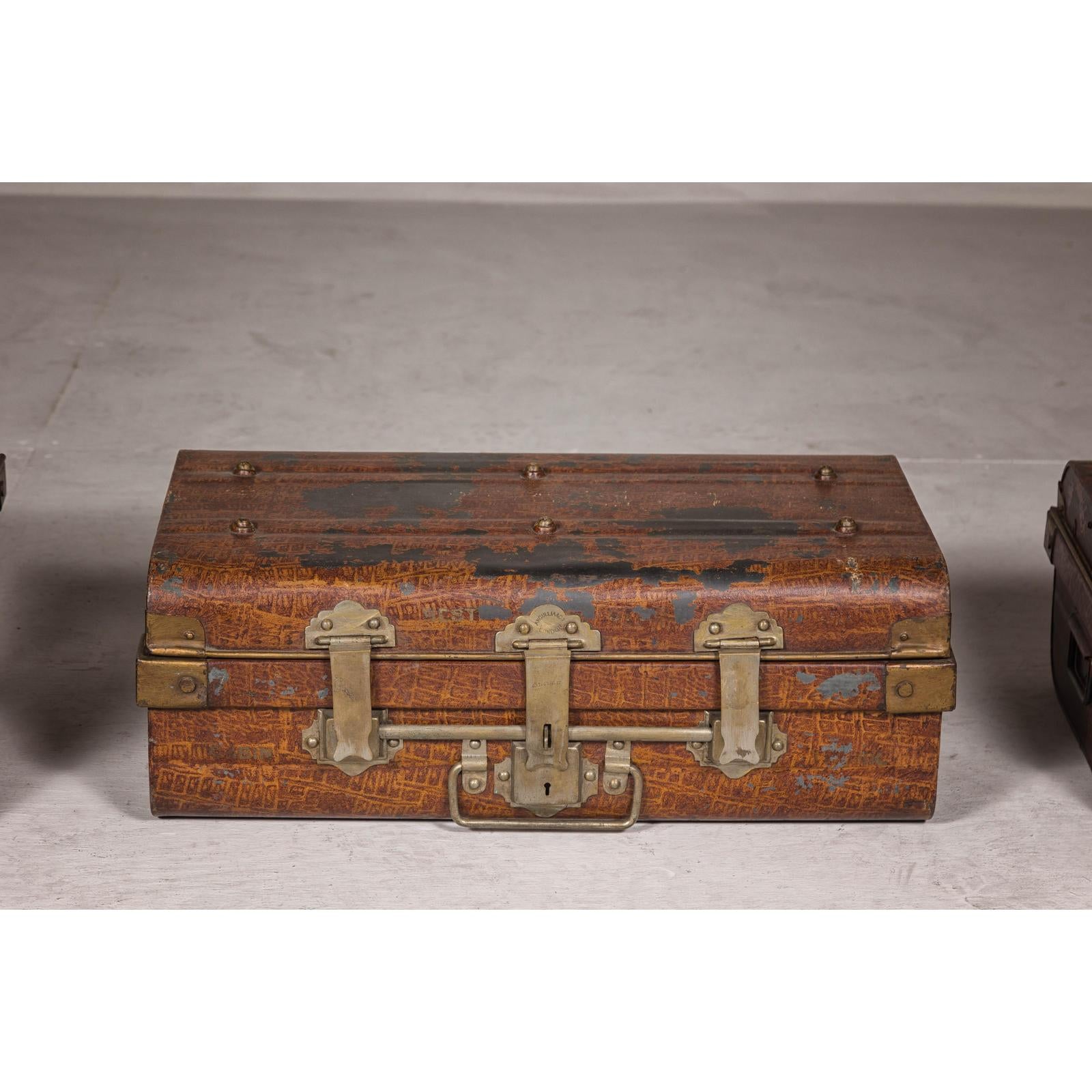 Set of Three British 1920s Metal Traveling Trunks for Export with Brass Hardware