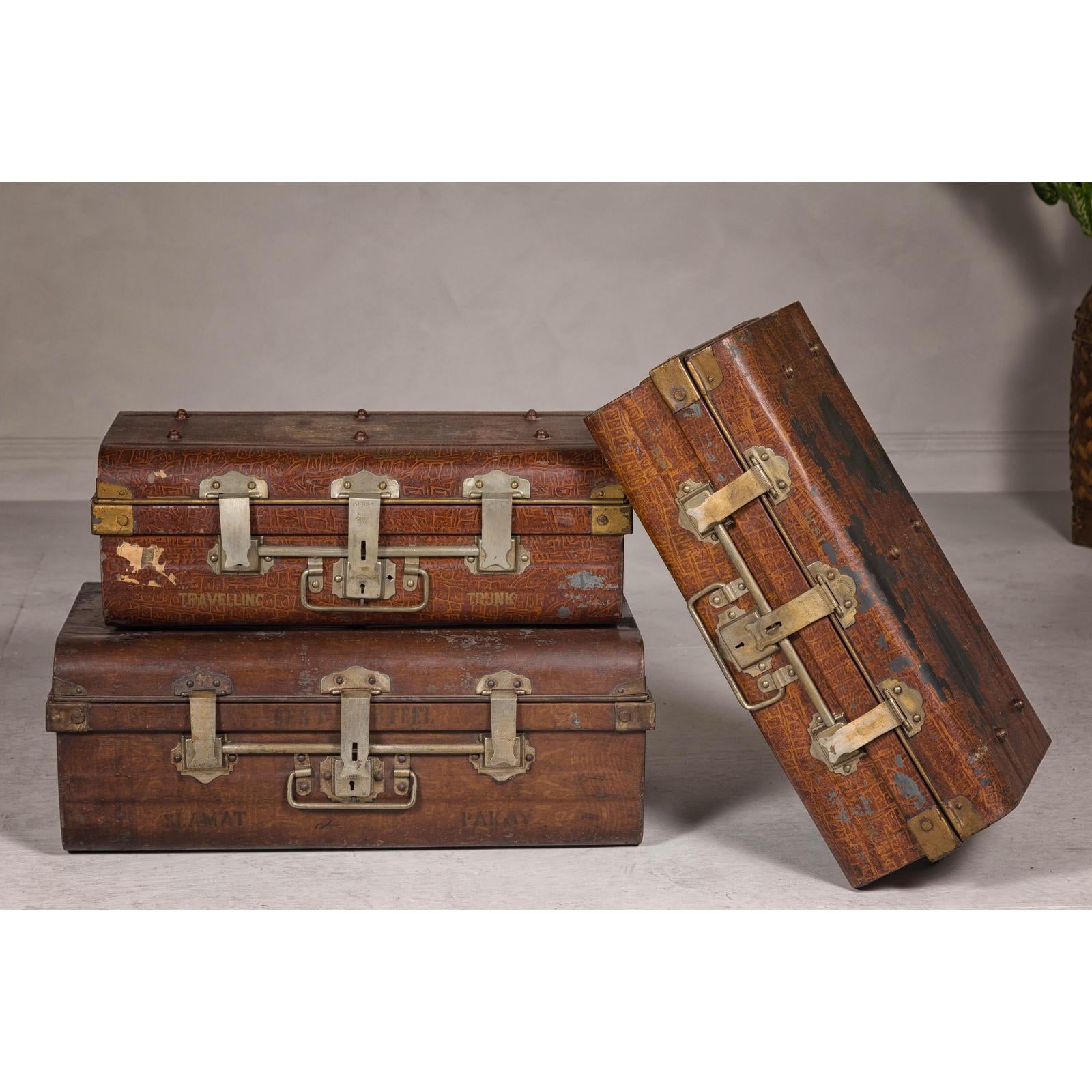 Set of Three British 1920s Metal Traveling Trunks for Export with Brass Hardware
