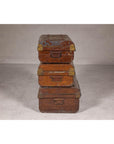Set of Three British 1920s Metal Traveling Trunks for Export with Brass Hardware