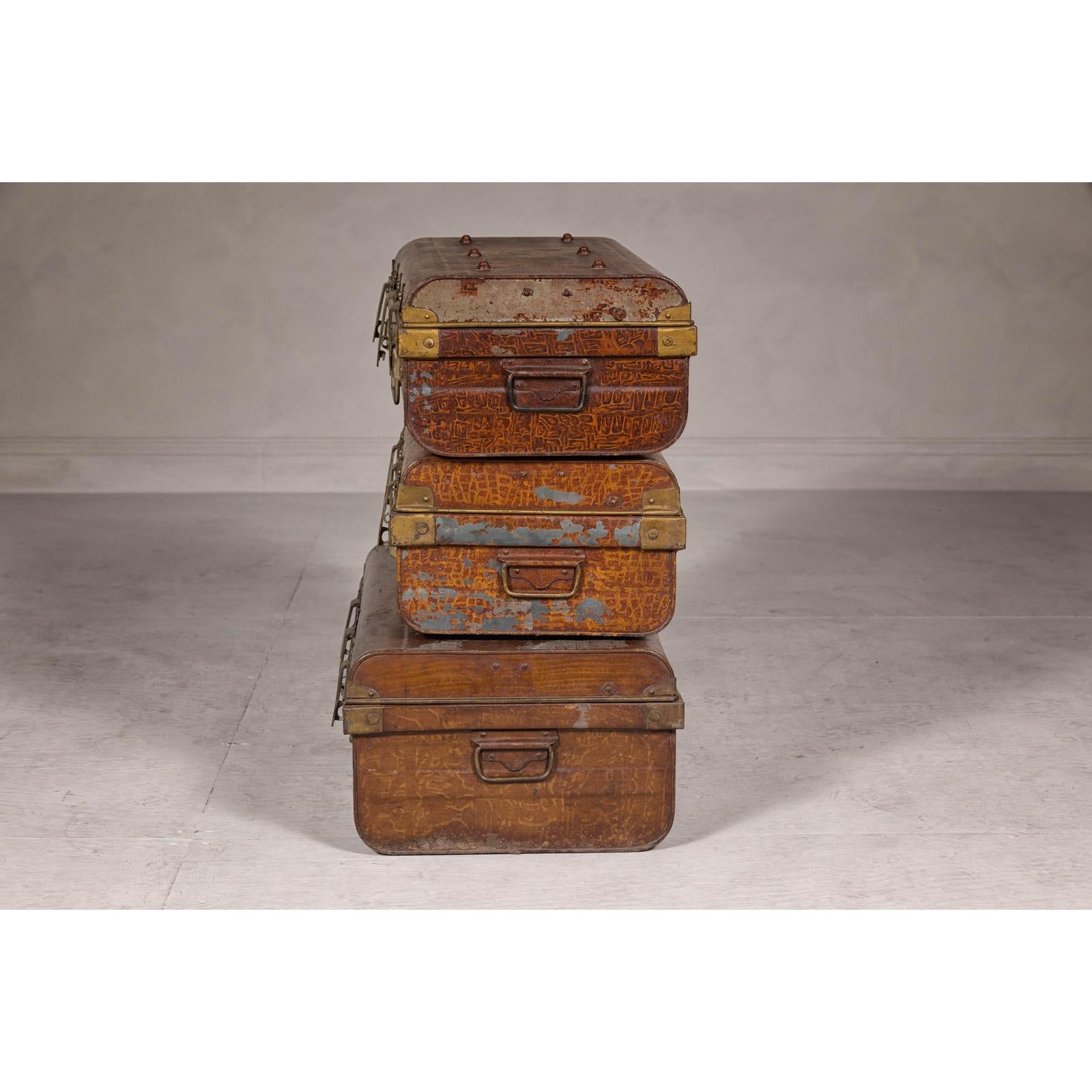 Set of Three British 1920s Metal Traveling Trunks for Export with Brass Hardware