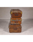 Set of Three British 1920s Metal Traveling Trunks for Export with Brass Hardware