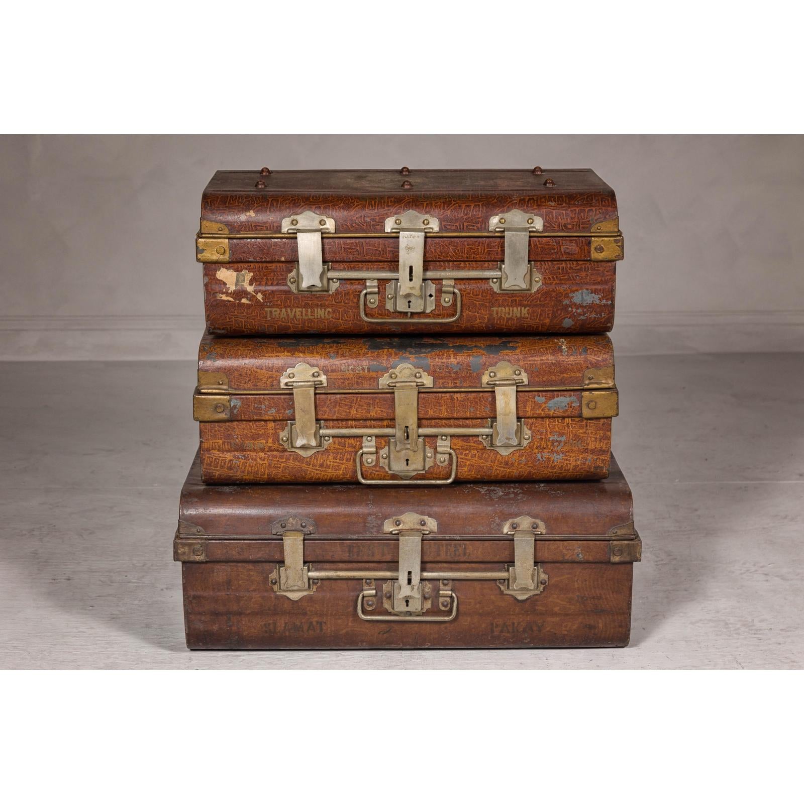 Set of Three British 1920s Metal Traveling Trunks for Export with Brass Hardware