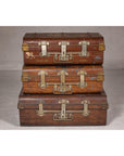 Set of Three British 1920s Metal Traveling Trunks for Export with Brass Hardware