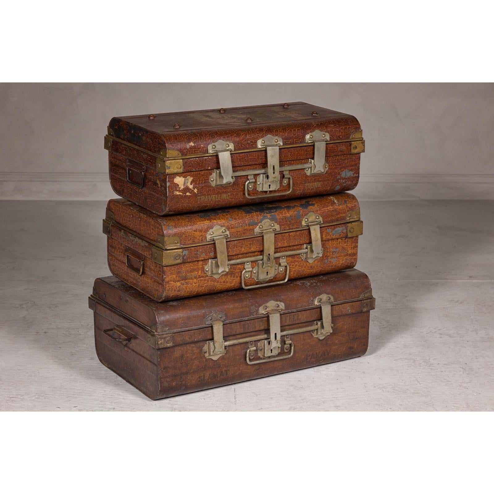 Set of Three British 1920s Metal Traveling Trunks for Export with Brass Hardware