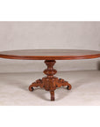 Dutch Colonial Oval Pedestal Dining Table with Scrolling Base, Late 19th Century