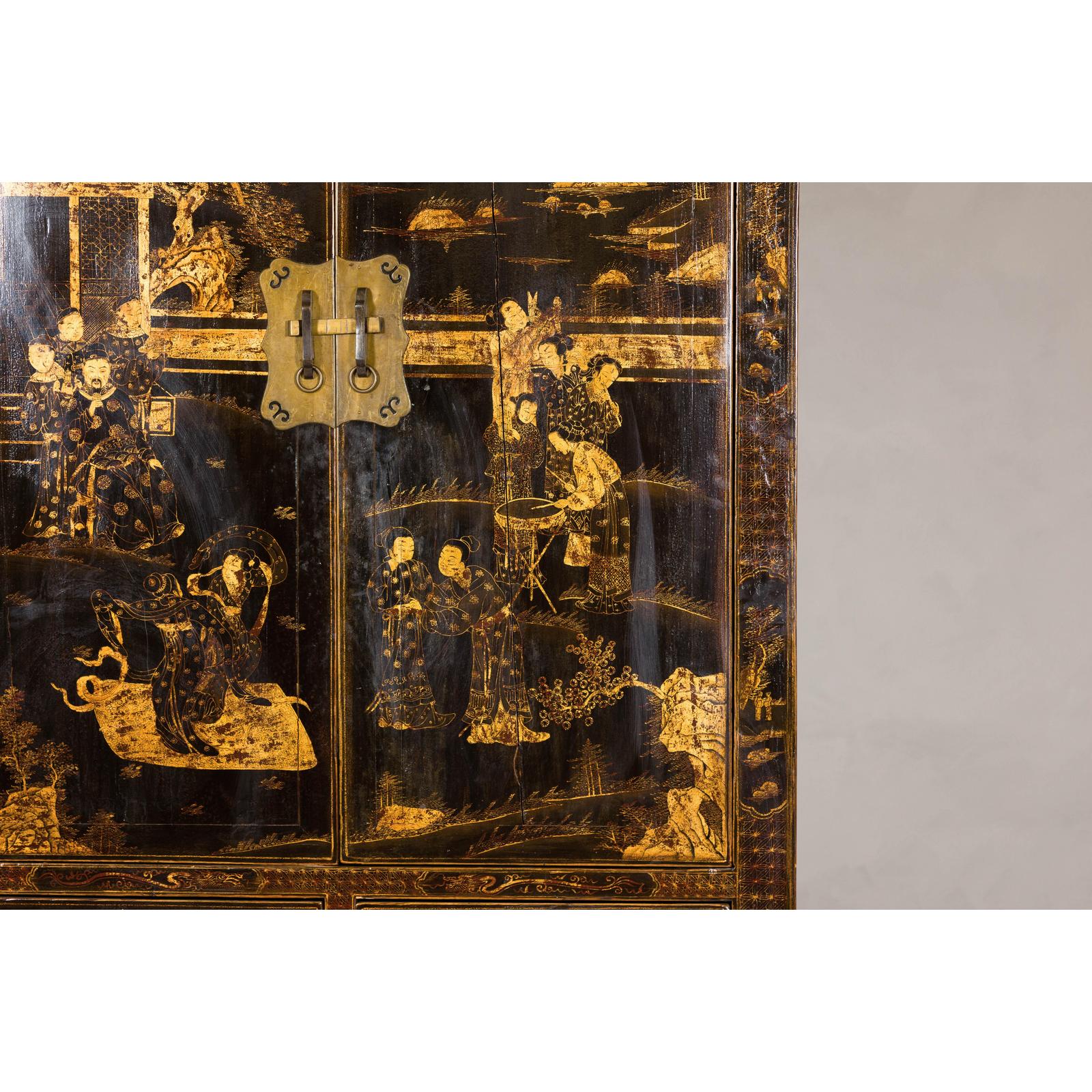 Late Qing Dynasty Black Lacquer Elm Cabinet with Gilt Motifs and Carved Apron