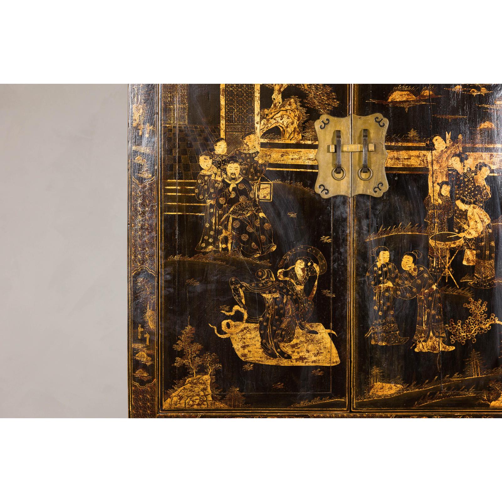 Late Qing Dynasty Black Lacquer Elm Cabinet with Gilt Motifs and Carved Apron