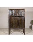 Late Qing Dynasty Black Lacquer Elm Cabinet with Gilt Motifs and Carved Apron