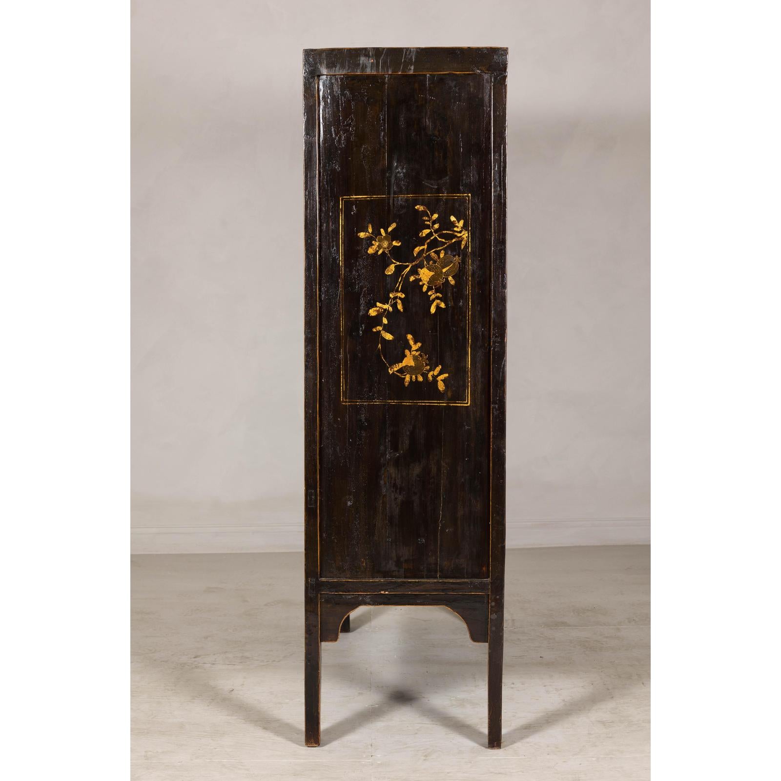 Late Qing Dynasty Black Lacquer Elm Cabinet with Gilt Motifs and Carved Apron