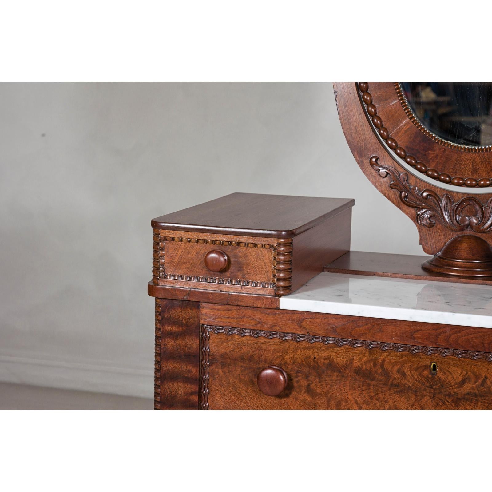 Late 19th Century Flaming Walnut Dresser with Tilting Mirror and Marble Inset