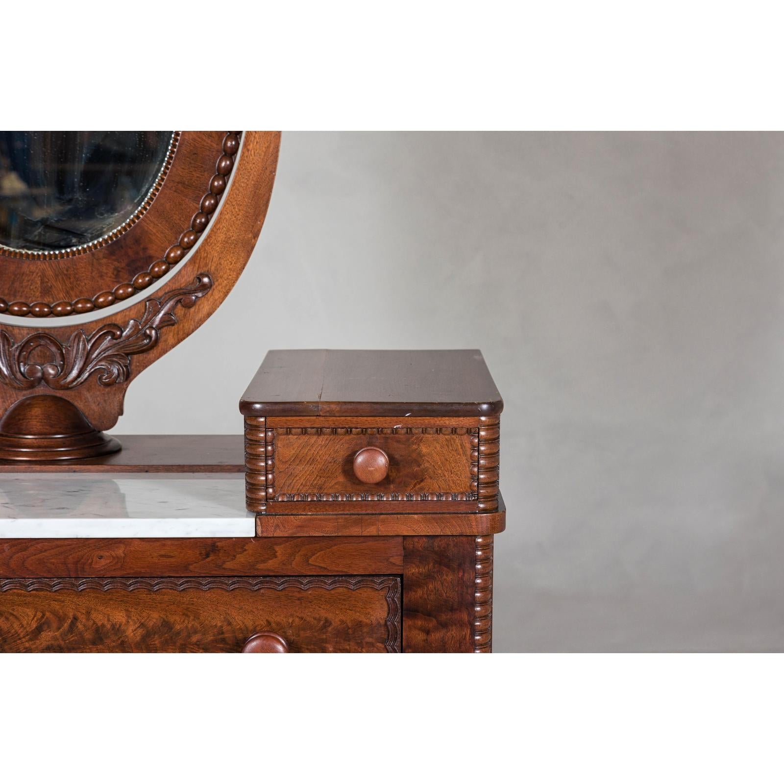 Late 19th Century Flaming Walnut Dresser with Tilting Mirror and Marble Inset