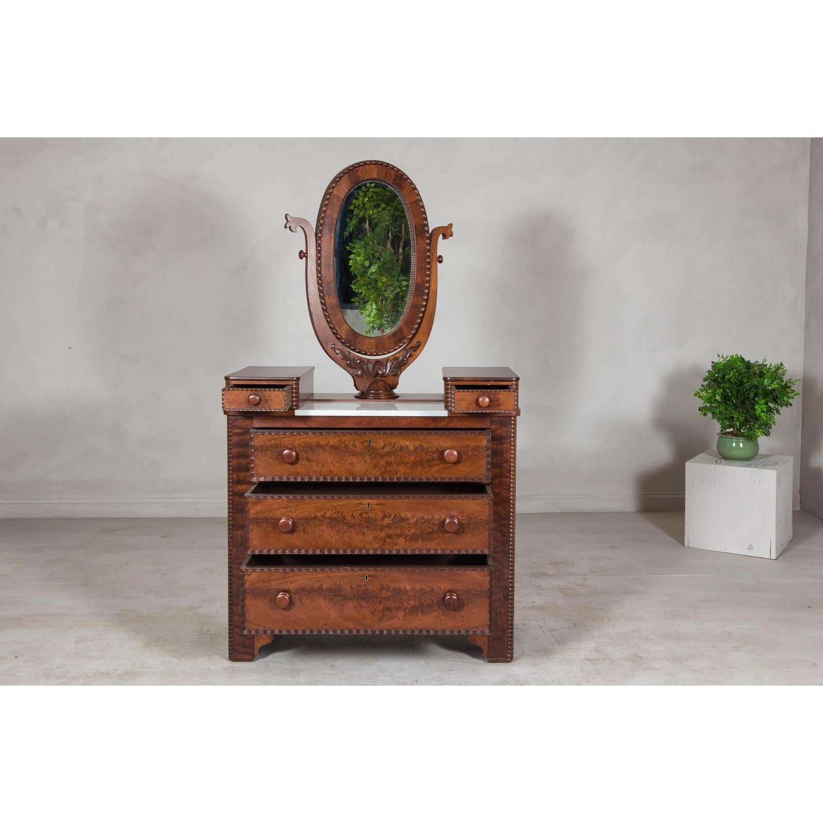 Late 19th Century Flaming Walnut Dresser with Tilting Mirror and Marble Inset