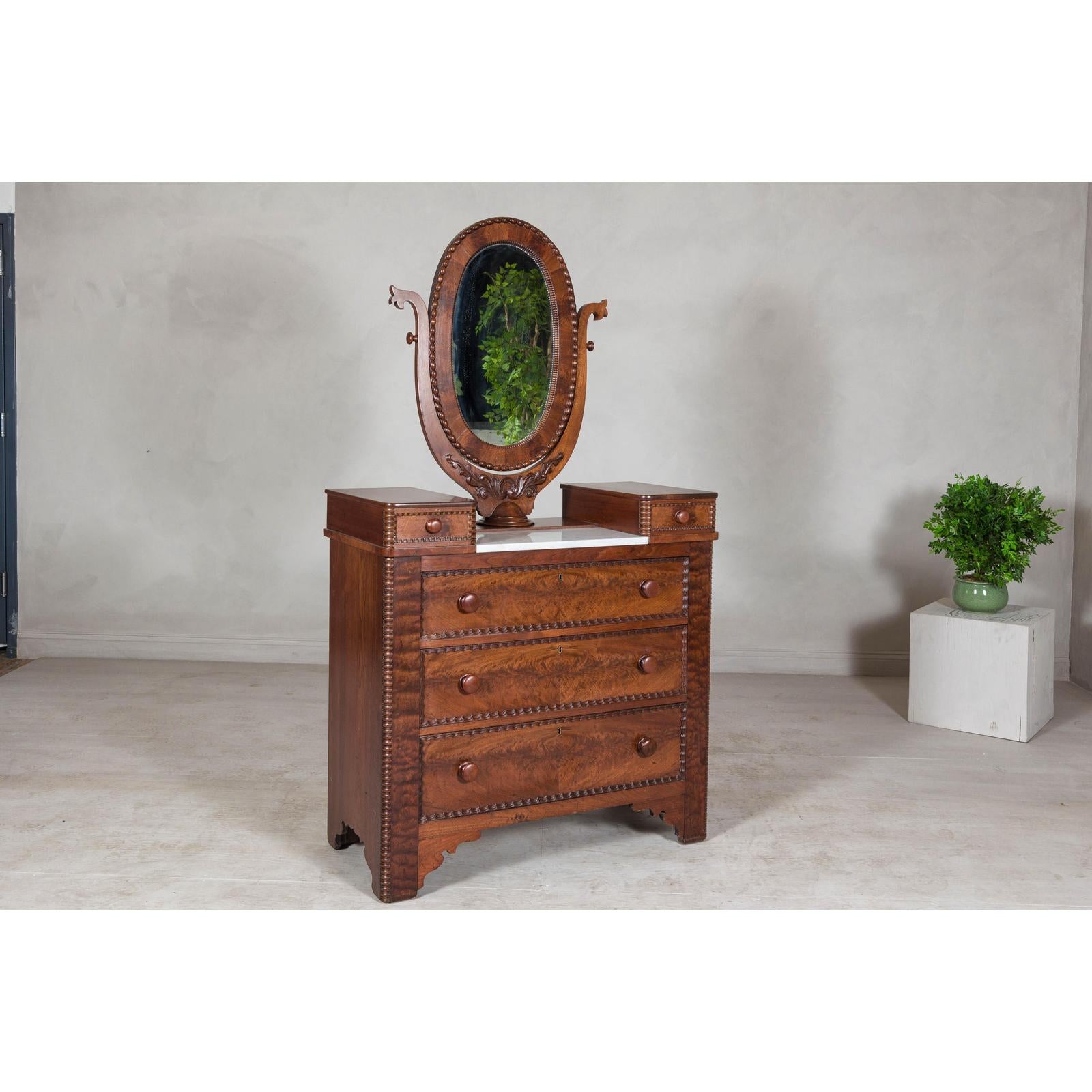 Late 19th Century Flaming Walnut Dresser with Tilting Mirror and Marble Inset