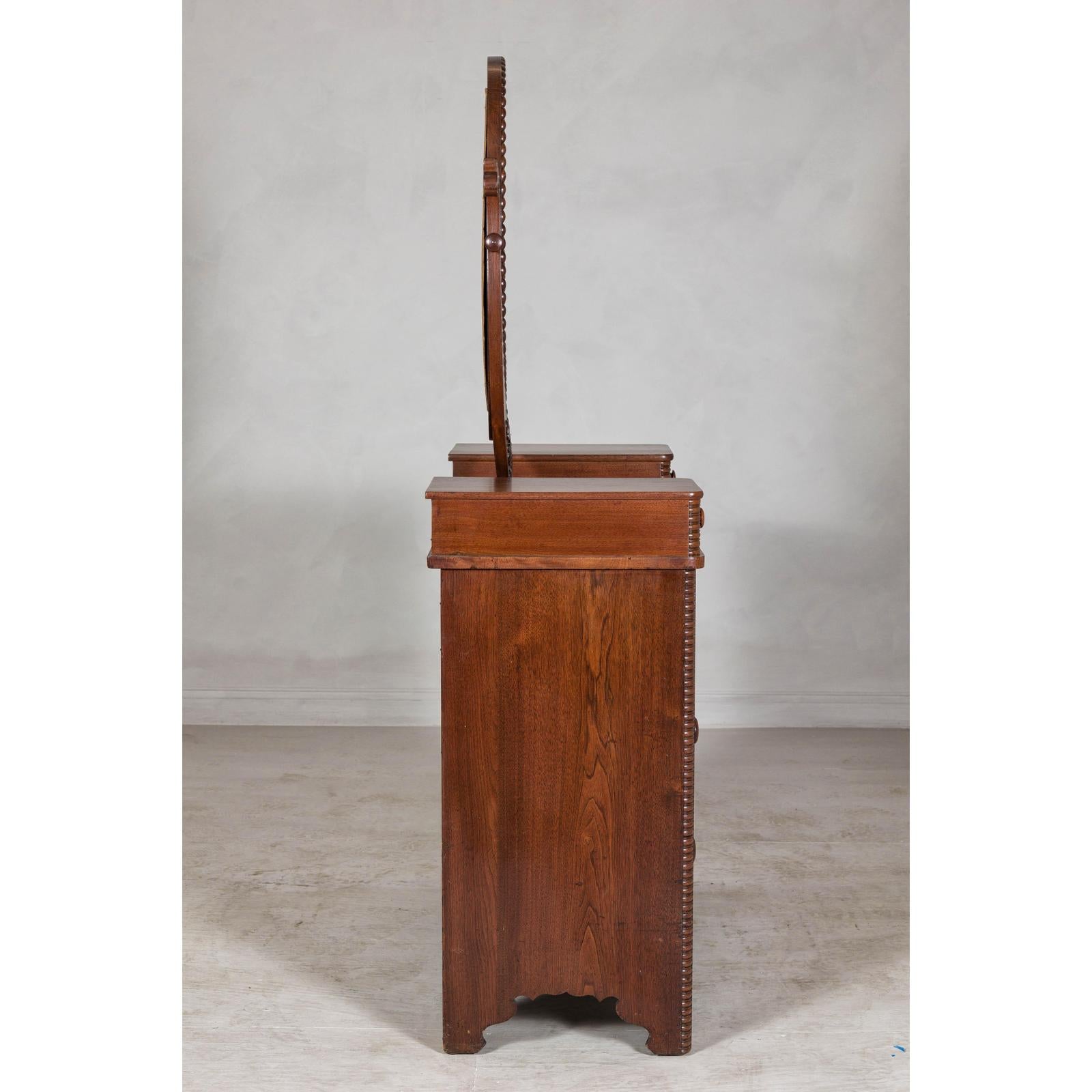 Late 19th Century Flaming Walnut Dresser with Tilting Mirror and Marble Inset
