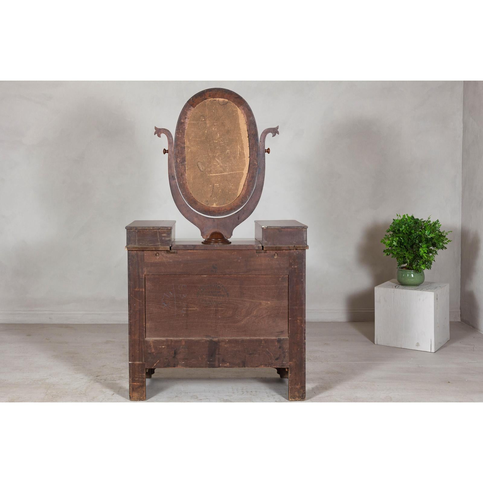 Late 19th Century Flaming Walnut Dresser with Tilting Mirror and Marble Inset