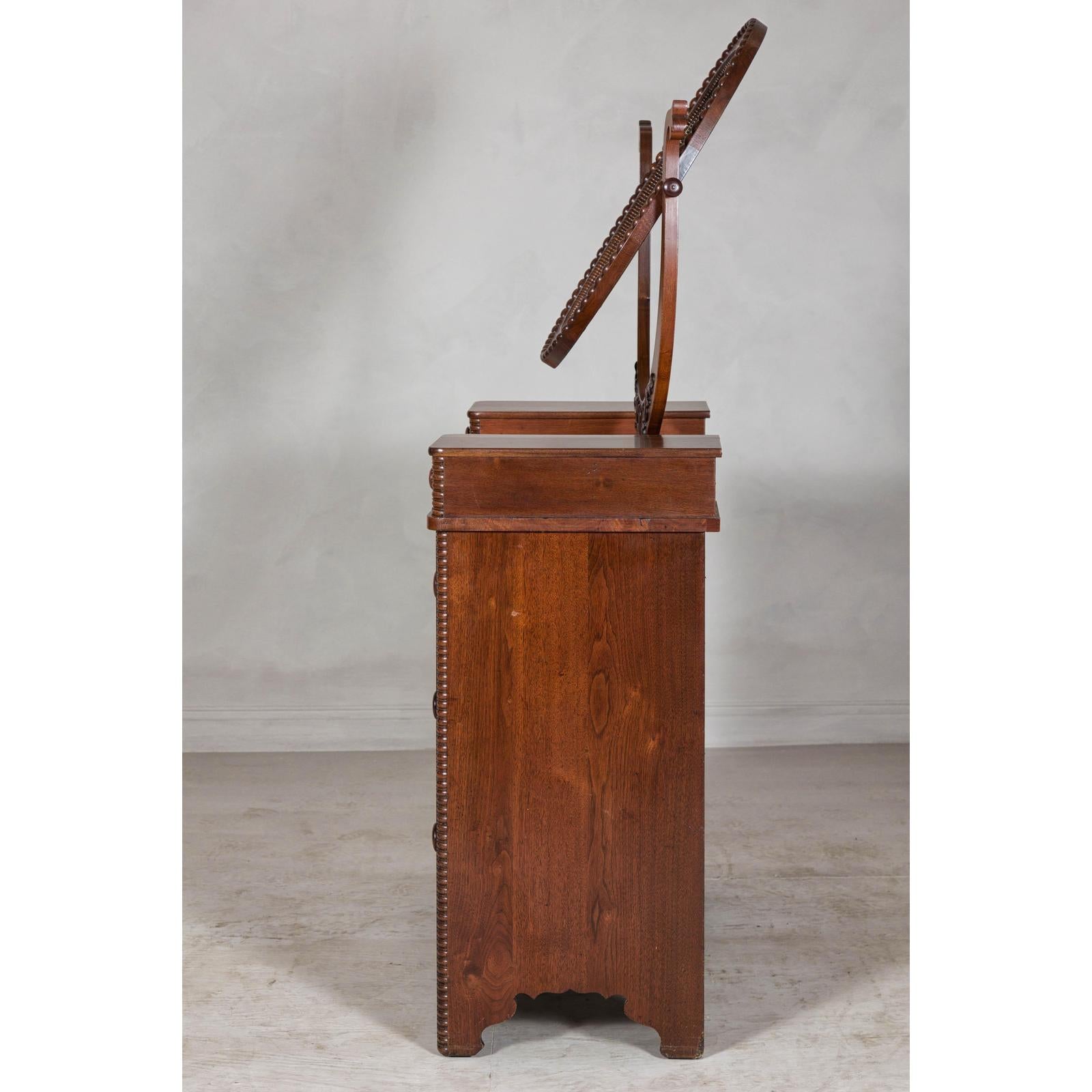 Late 19th Century Flaming Walnut Dresser with Tilting Mirror and Marble Inset