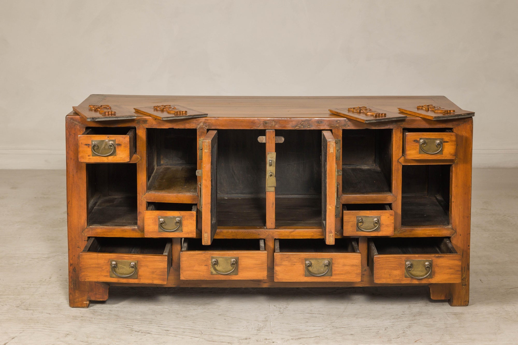 Late Qing Dynasty Elm Sideboard with Carved Floral Vases, Doors and Drawers