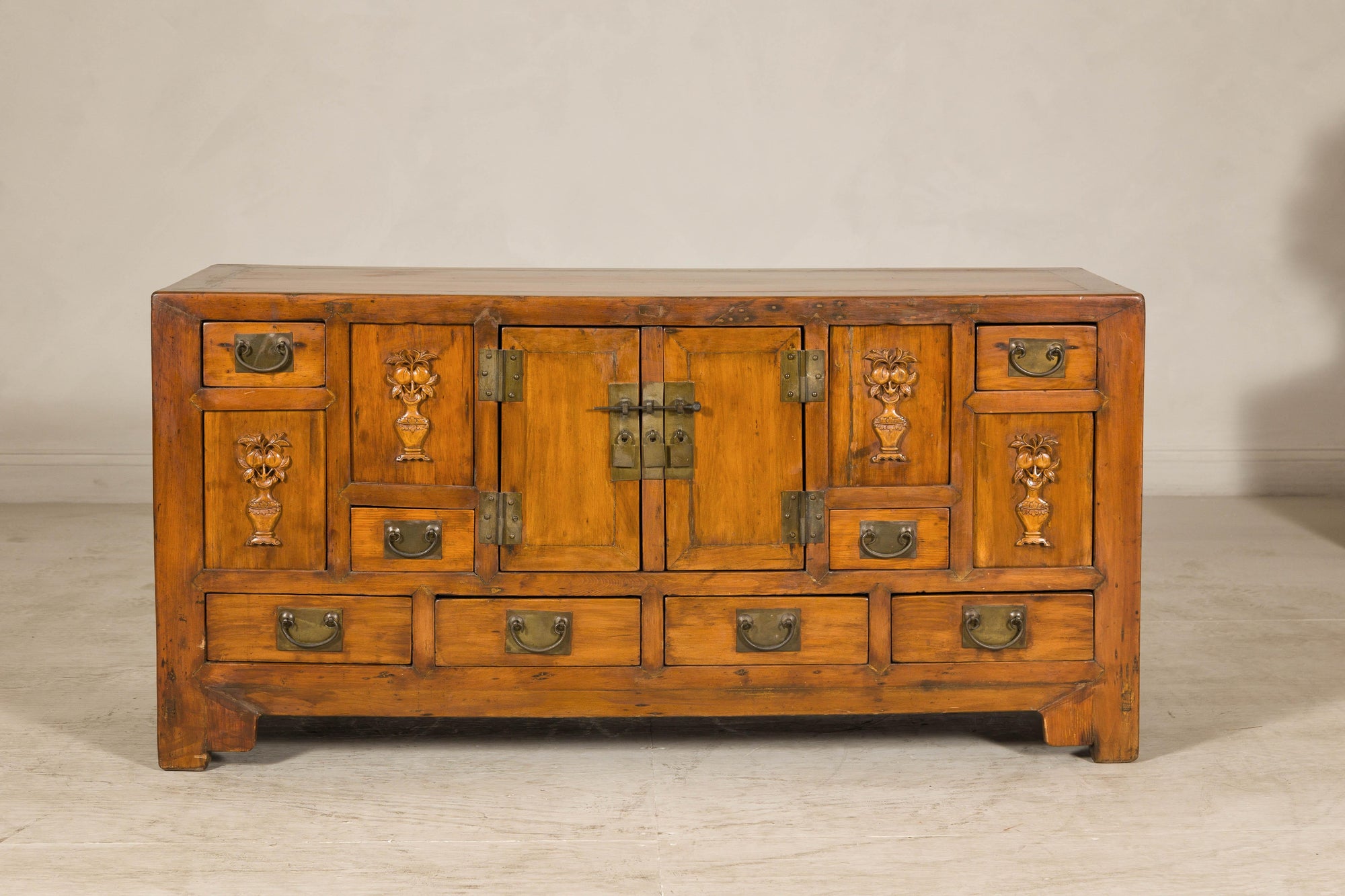 Late Qing Dynasty Elm Sideboard with Carved Floral Vases, Doors and Drawers