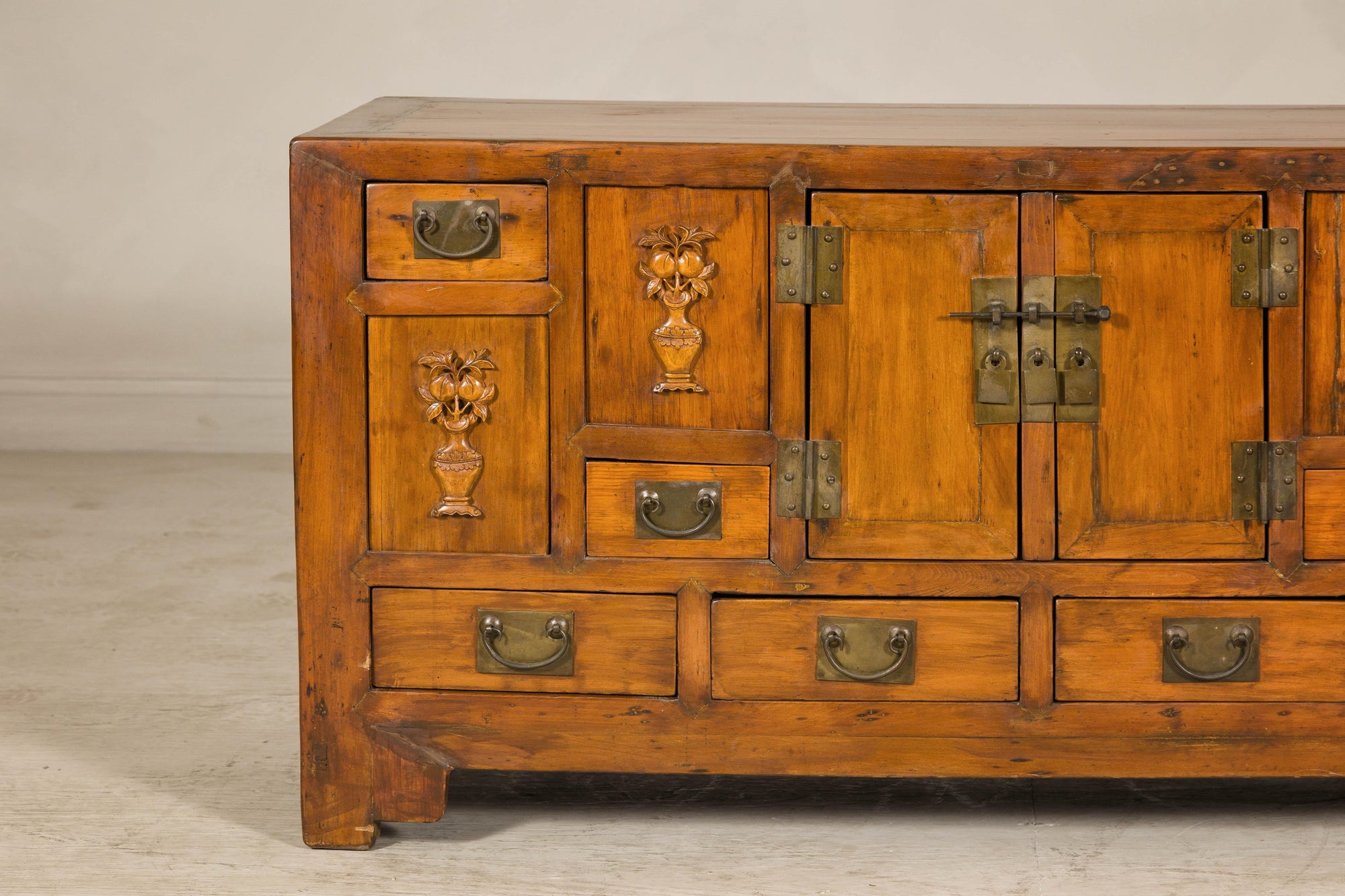 Late Qing Dynasty Elm Sideboard with Carved Floral Vases, Doors and Drawers
