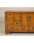 Late Qing Dynasty Elm Sideboard with Carved Floral Vases, Doors and Drawers