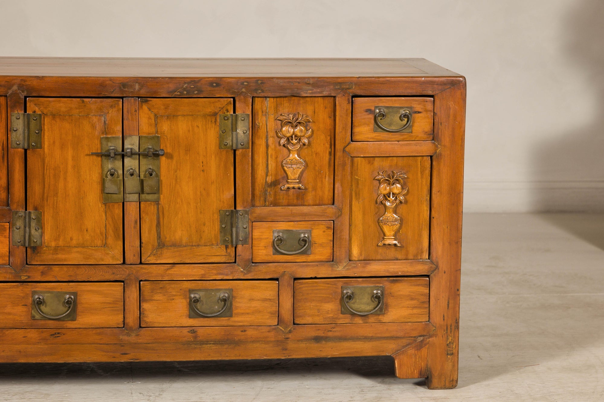Late Qing Dynasty Elm Sideboard with Carved Floral Vases, Doors and Drawers