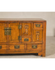 Late Qing Dynasty Elm Sideboard with Carved Floral Vases, Doors and Drawers