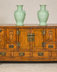 Late Qing Dynasty Elm Sideboard with Carved Floral Vases, Doors and Drawers