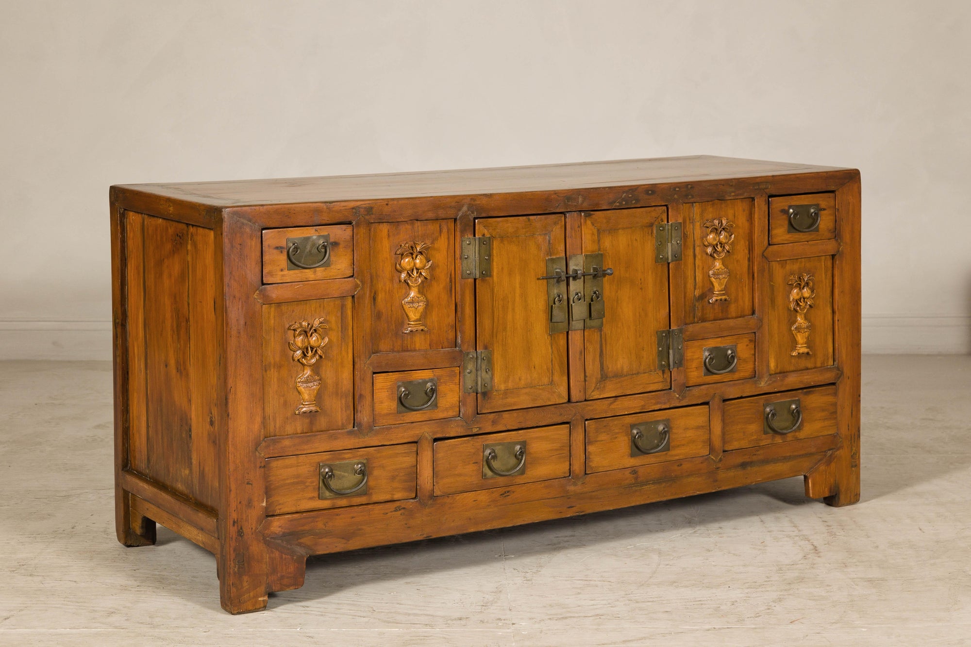 Late Qing Dynasty Elm Sideboard with Carved Floral Vases, Doors and Drawers