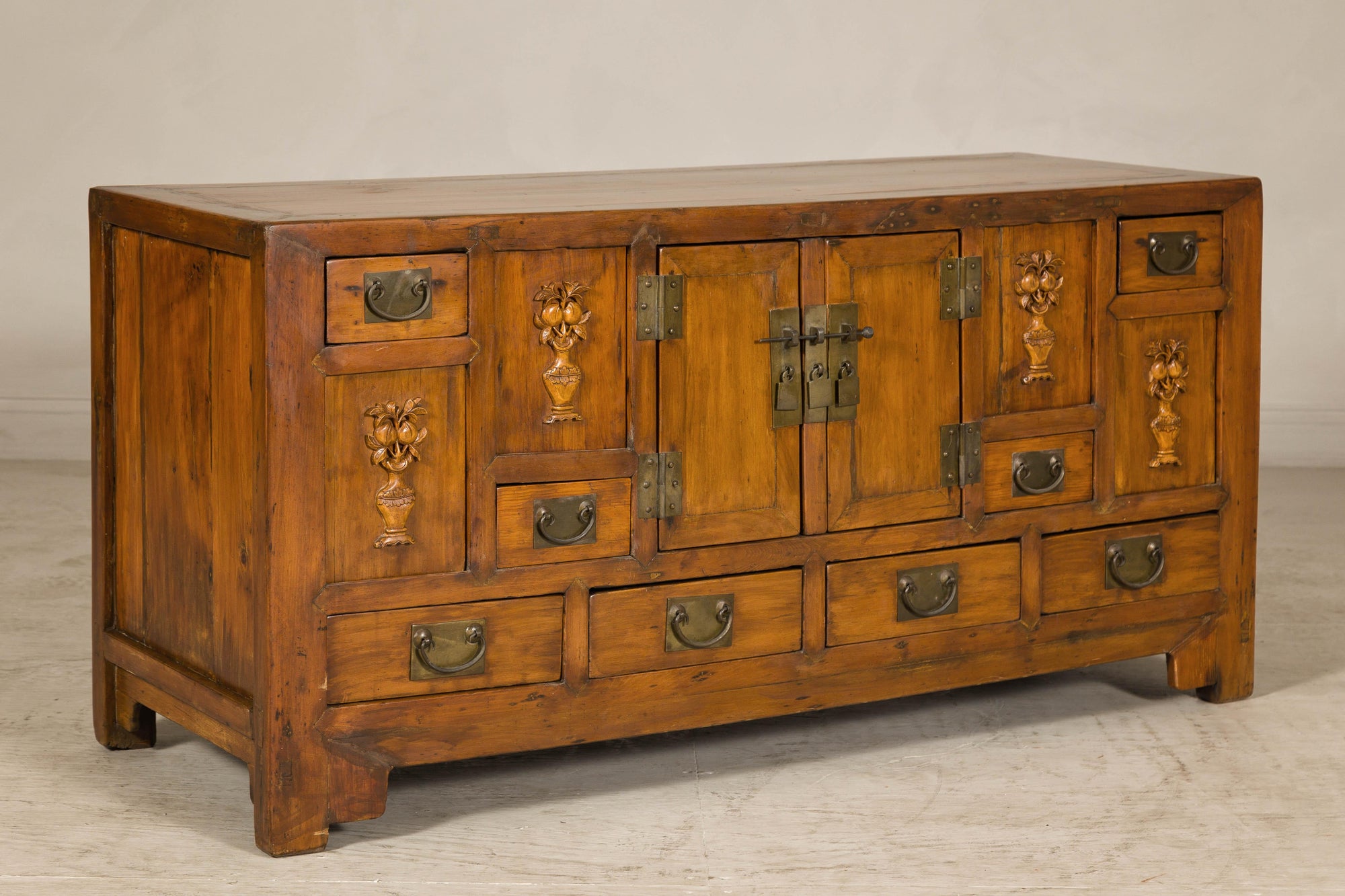 Late Qing Dynasty Elm Sideboard with Carved Floral Vases, Doors and Drawers