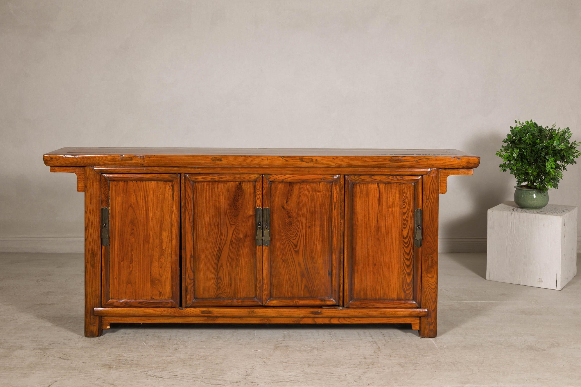 Qing Dynasty Elm Sideboard in Honey Lacquer with Four Doors and Brass Hardware