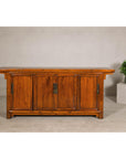 Qing Dynasty Elm Sideboard in Honey Lacquer with Four Doors and Brass Hardware