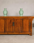 Qing Dynasty Elm Sideboard in Honey Lacquer with Four Doors and Brass Hardware