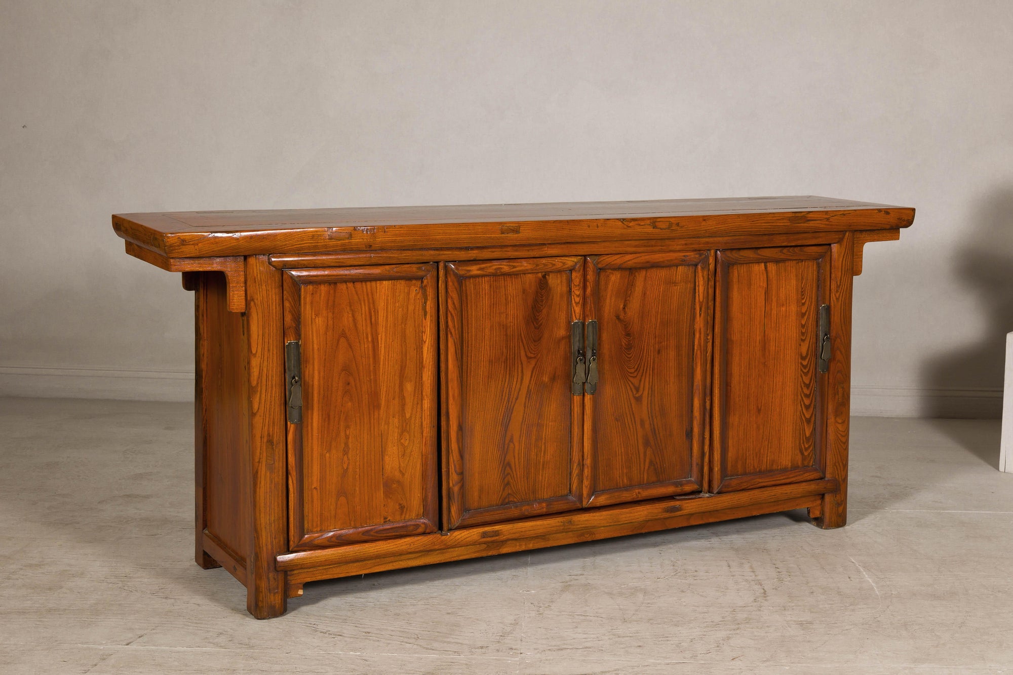 Qing Dynasty Elm Sideboard in Honey Lacquer with Four Doors and Brass Hardware