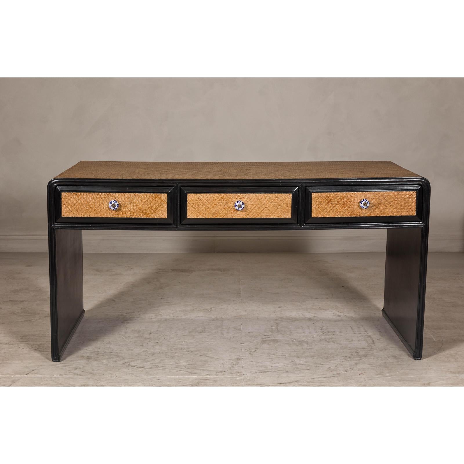 Rattan over Wood Waterfall Desk with Black Lacquer Finish and Three Drawers