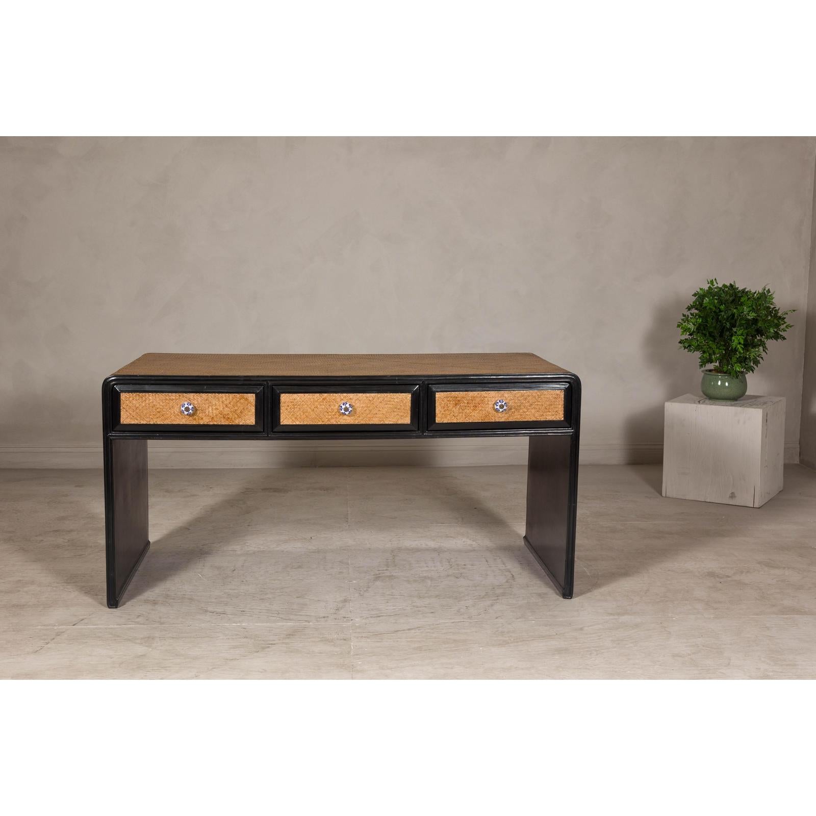 Rattan over Wood Waterfall Desk with Black Lacquer Finish and Three Drawers