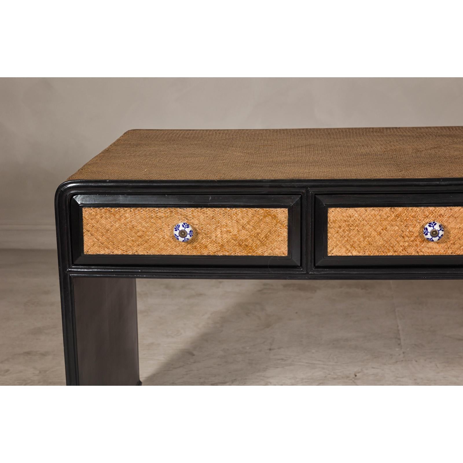 Rattan over Wood Waterfall Desk with Black Lacquer Finish and Three Drawers