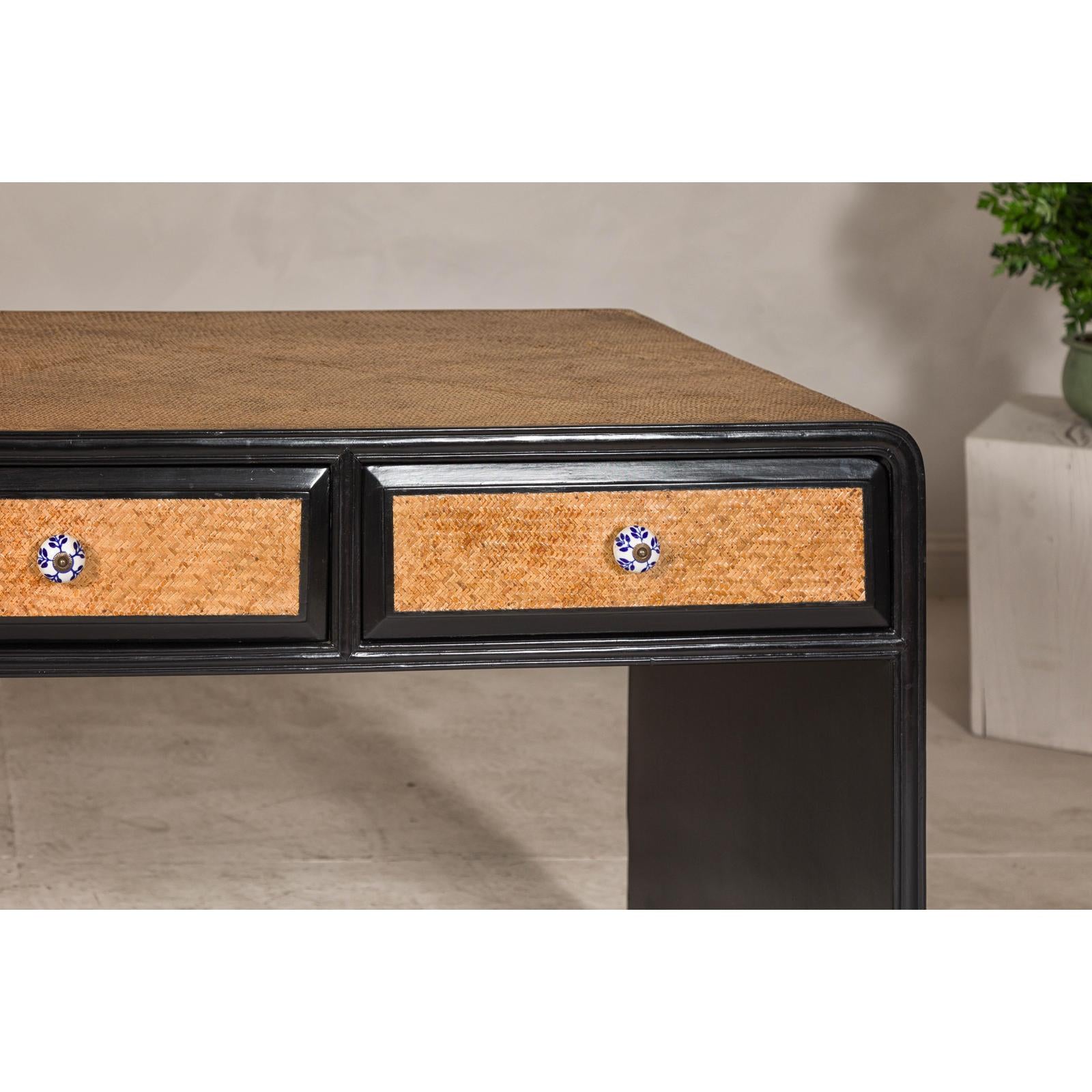Rattan over Wood Waterfall Desk with Black Lacquer Finish and Three Drawers