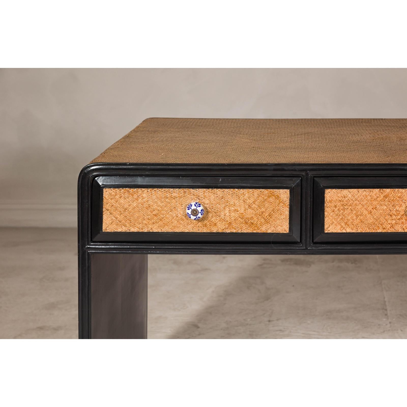 Rattan over Wood Waterfall Desk with Black Lacquer Finish and Three Drawers