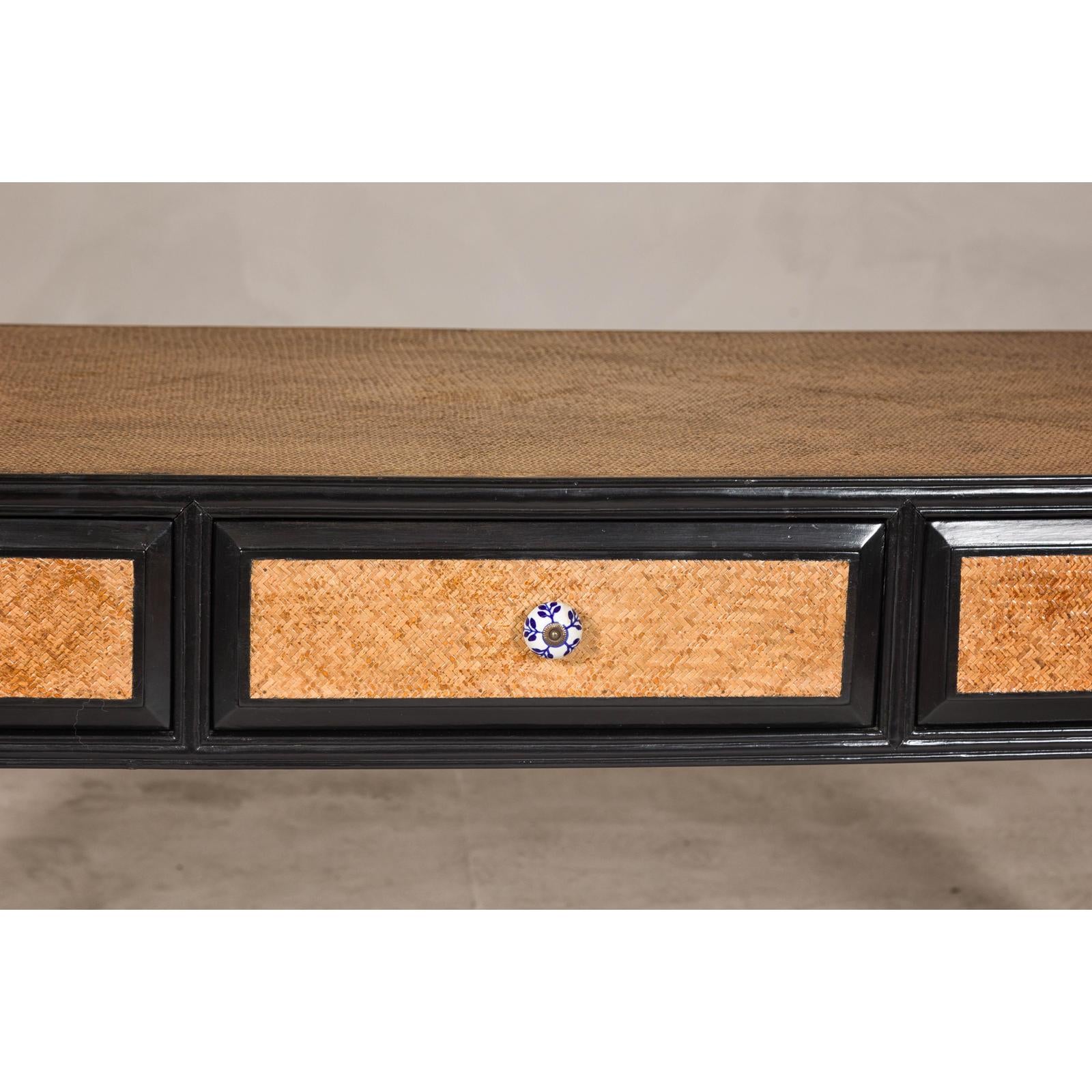 Rattan over Wood Waterfall Desk with Black Lacquer Finish and Three Drawers